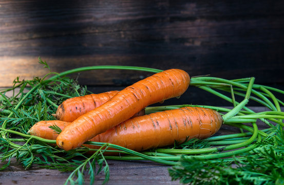 carrots on wooden surface