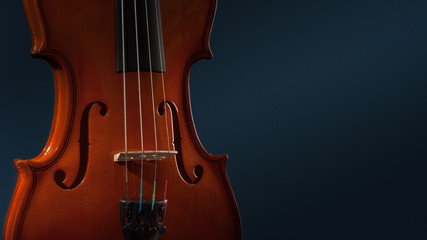 Violin musical instruments of orchestra closeup on black