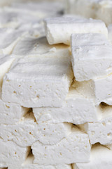 Organic homemade cheese in slices