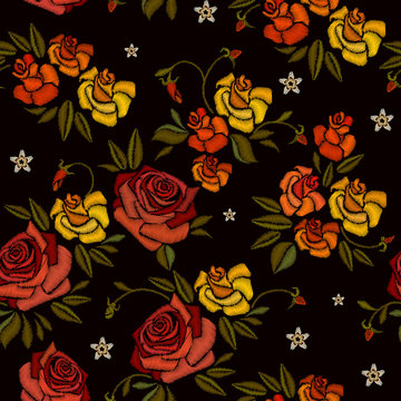 Embroidery beautiful buds of roses hand drawn seamless pattern. Roses embroidery seamless pattern on black background. Template for fashion clothes, t-shirt design