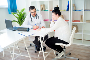 Doctor examining a woman