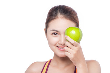 Isolated brown hair fitness asian woman with an apple