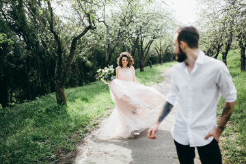  Loves and very happy groom and bride in the park
