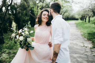  Loves and very happy groom and bride in the park