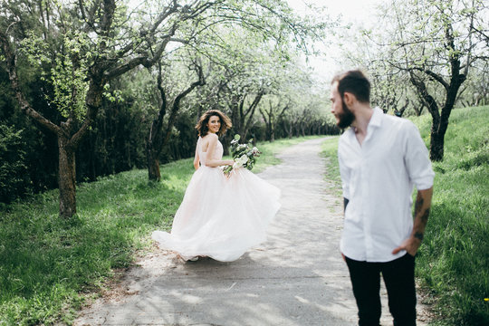  Loves and very happy groom and bride in the park