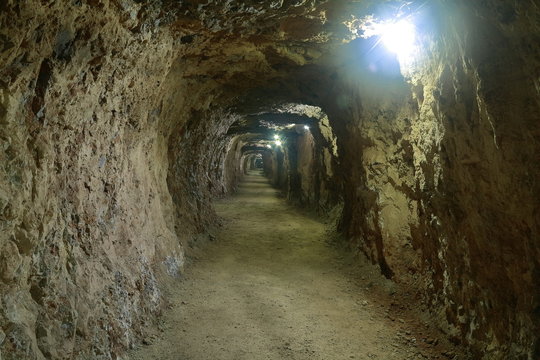 Illuminated alley of a mine.