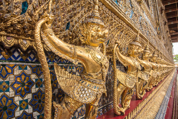 Wat Phra Kaew. Temple of the Emerald Buddha is regarded as the most sacred Buddhist temple in Bangkok Thailand.
