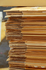 Stacking used cardboard box for recycling