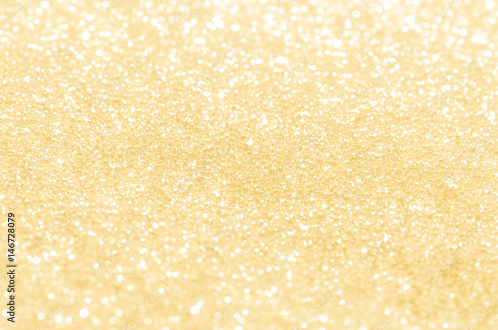 Wall mural gold abstract background with bokeh.