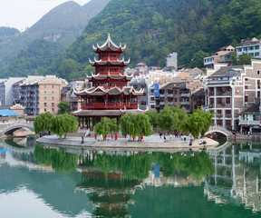 Fototapeta premium Ancient Pagoda in Zhenyuan Ancient Town on Wuyang river in Guizhou Province, China