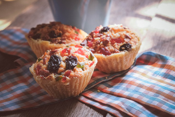fruit tart close up with berries on wooden