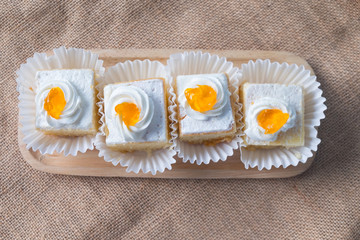 Piece of homemade sliced cake with creamy