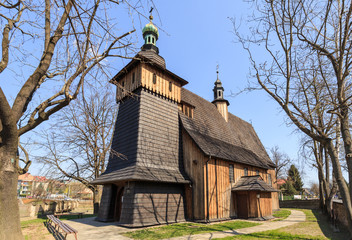 Kościół NMP – zabytkowy drewniany gotycki kościół, w Tarnowie, nad potokiem Wątok,
popularnie nazywany kościołem na Burku od miejscowej nazwy pobliskiego targowiska, został wzniesiony w 1458 roku na  - obrazy, fototapety, plakaty
