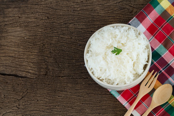 grains cooking of Thai jasmine rice or white rice in bowl on wooden Backgrivd
