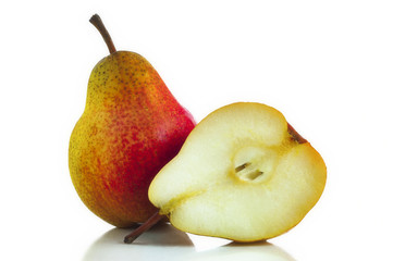 One whole and one sliced pear
