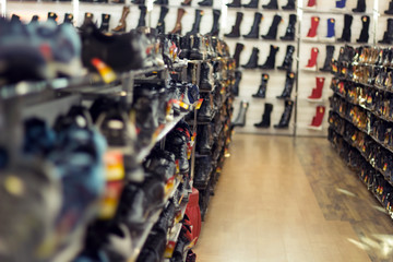 Obraz premium blurred background with shoes on shelves in a Shoe store