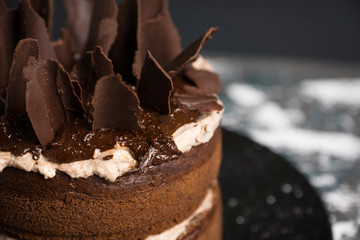 Chocolate cake on the rustic background. Selective focus.