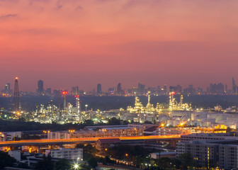 Fototapeta na wymiar Twilight of oil refinery ,Oil refinery and Petrochemical plant at dusk , Bangkok, Thailand