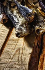 The dried fish lies on the boards