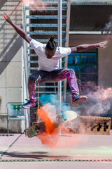 Skating Skater Skateboard with Holi Powder © felix_brönnimann