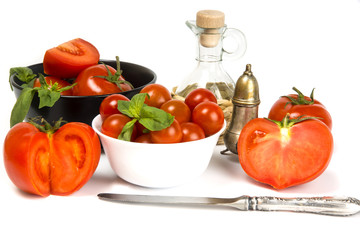 Red tomatoes on a white background, isolated