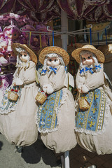 Handmade dolls for sale at a tourist shop in Avignon