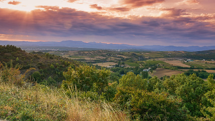 Fototapeta na wymiar Panorama of a valley in the Ardeche with in the background the mountains of the Ardeche