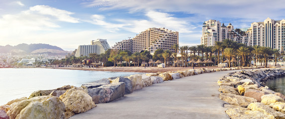 Panoramic view on central public beach of Eilat - the southernmost port and famous resort and...