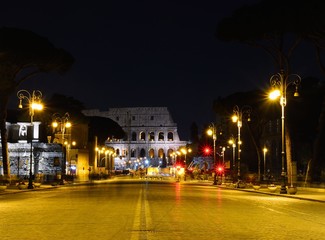 Naklejka premium Colosseum illuminated in Rome.