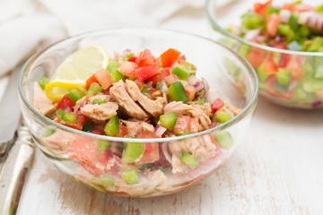 tuna salad with tomato and pepper in bowl