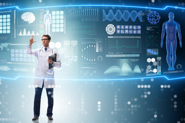 Doctor in futuristic medical concept pressing button