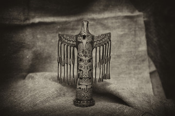  totem in the form of a bird. Vintage style
