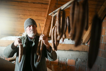 Man drying sausages