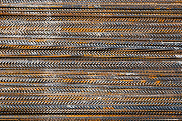 Thick rusty rebar-rods, metallic texture pattern.