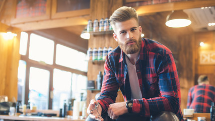 Young Man in Barbershop Hair Care Service Concept