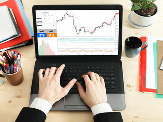 Businessman Working Plan On A Wooden Table. Working Home Concept