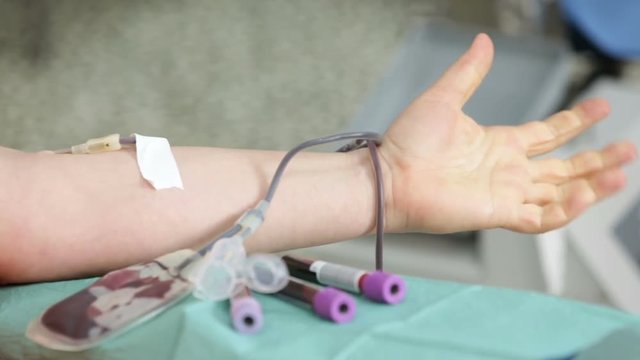 Blood donation hand. Nurse hands