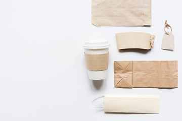 paper bags for food delivery restourant white table background top view mockup
