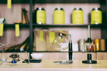 Glass siphon for tea is on the table