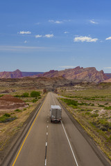 Semi-truck on desert highway in Utah