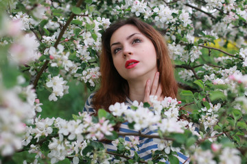 Fototapeta premium woman and flowers tree apple