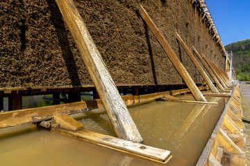 Salt production and air improvement. Europe's largest open air salt pans and open-air inhaler for health at the Salinental valley. Bad Kreuznach, Rhineland-Palatinate, Germany