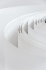 Topshot macro Paper roll in a printshop, vertical