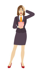 Businesswoman holding a piggy bank and grabbed his head