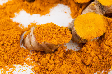 Turmeric roots isolated on white background