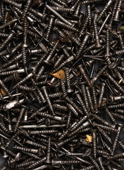 black oiled Bunch of screws