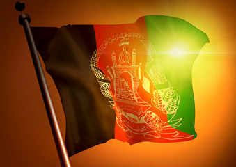 winner waving Afganistan flag against the sunset