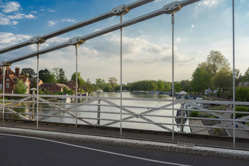 Fototapeta na wymiar Marlow Bridge at twilight on a spring evening. The bridge is designed by William Tierney Clark and was built between 1829 and 1832. Mr Clark is also responsible for designing the Budapest Chain Bridge