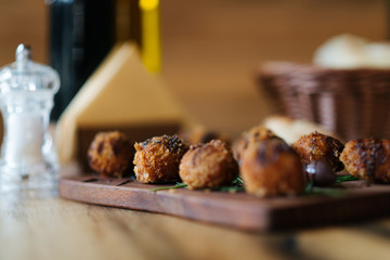 Breaded peppers stuffed with cheese