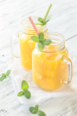Mango juice in mason jars